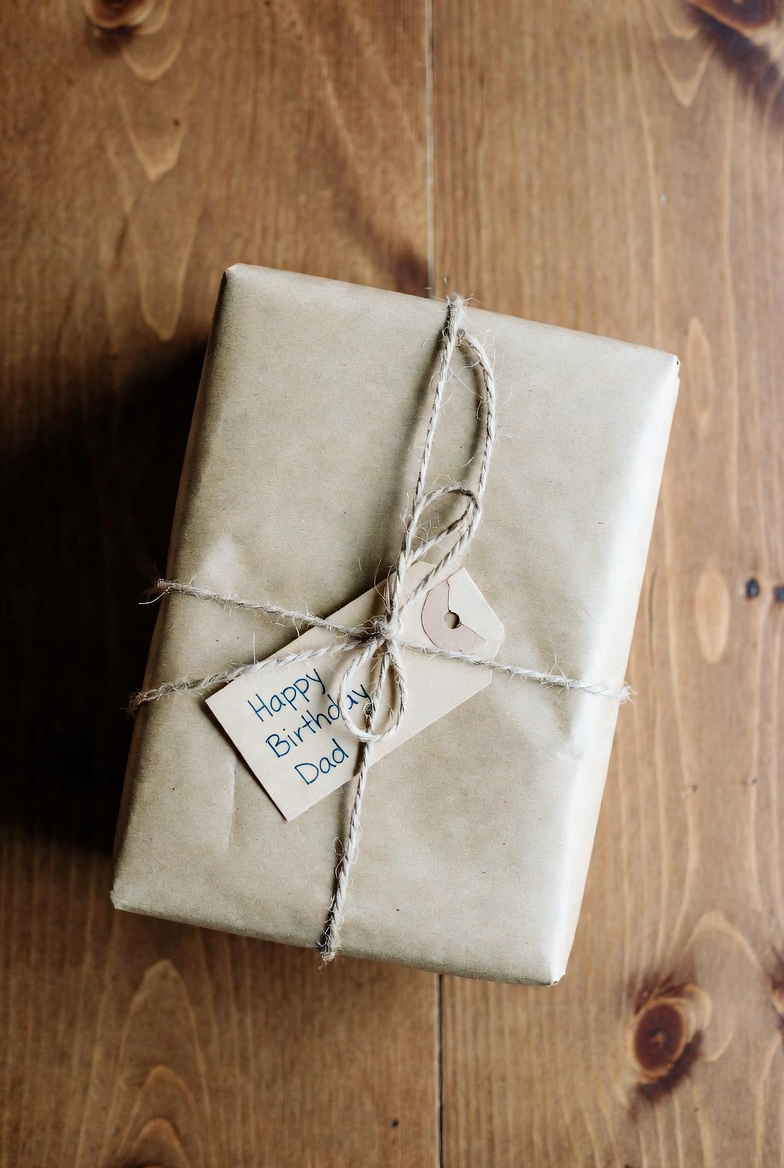 Wrapped birthday present with ribbon, ideal for tech gift ideas.